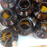 Amber glass capsule bottles w lid